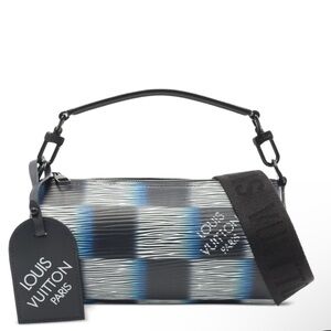 Louis Vuitton
Blue Damier Rush Soft Polochon PM